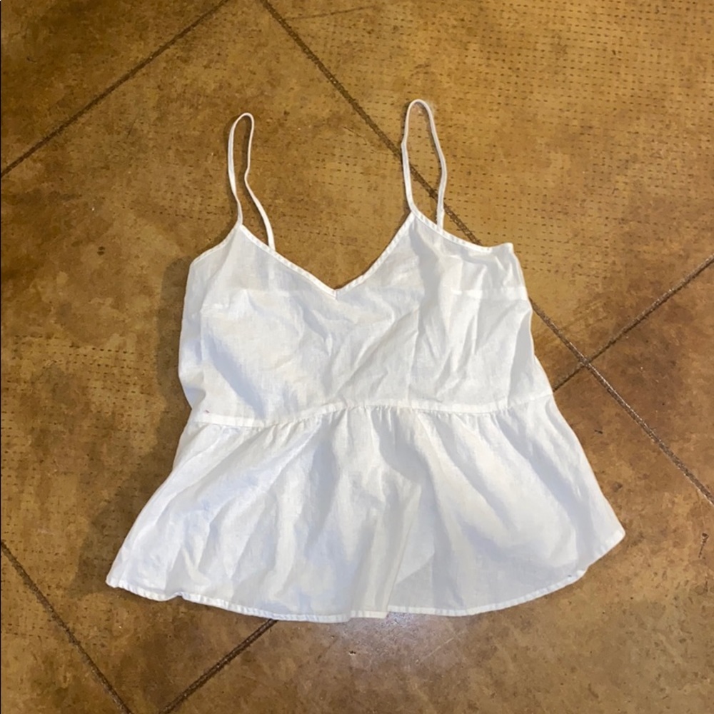 White peplum spaghetti strap shirt